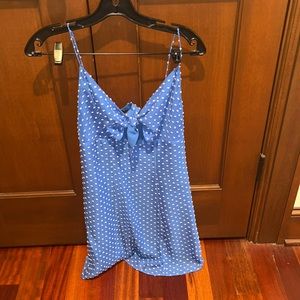 Blue dress with white polka dots. Size S. Zipper on back. Tie front